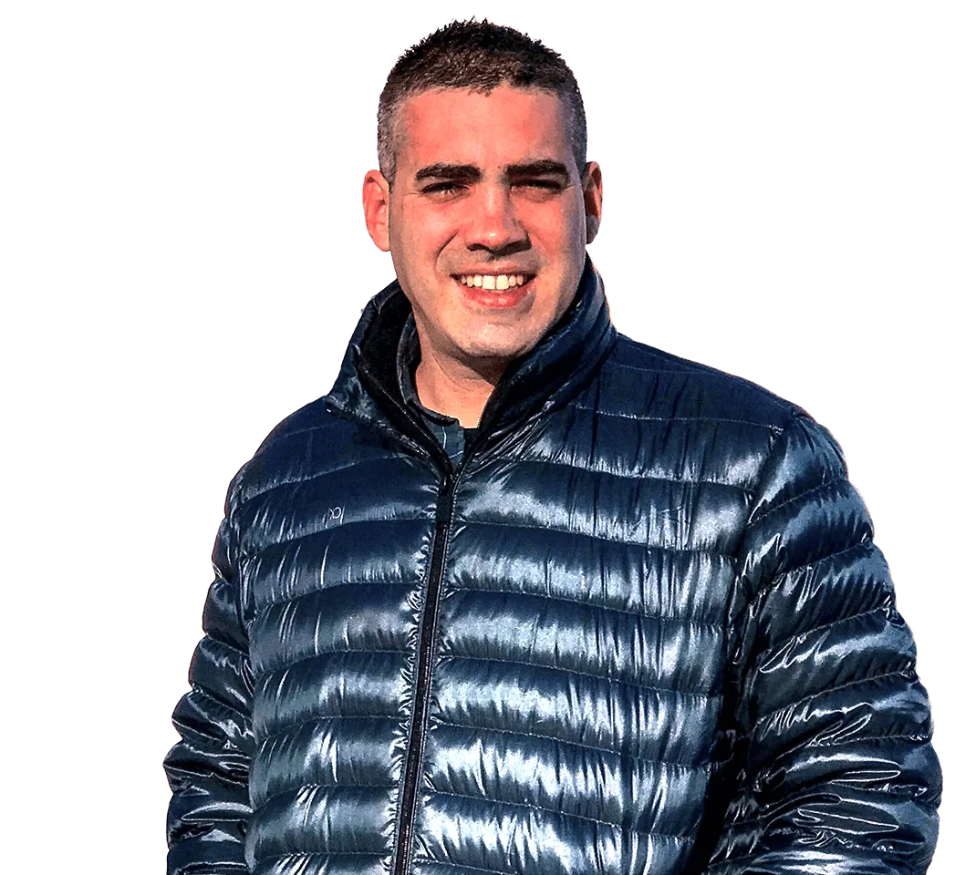 Assaf Sheep, CTO, smiling in a dark puffer jacket